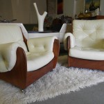 Matching pair of G Plan Saddle Back Armchairs in Italian Cream Leather £595 SOLD